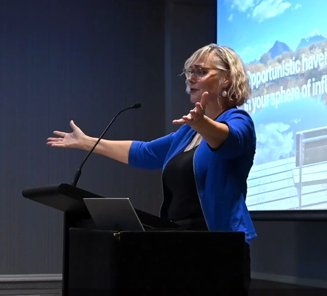 Facilitator speaking to a small audience